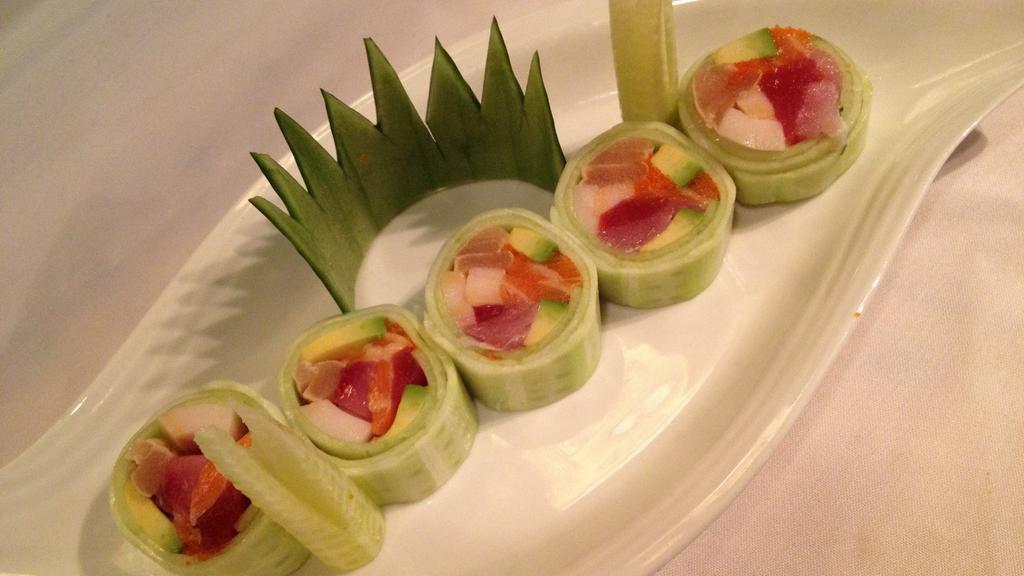 Rainbow Naruto Roll · Tuna, salmon, yellowtail, white fish, caviar and avocado wrapped with cucumber. Raw.