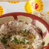 Baba Ghanoush  · Fire Roasted eggplant, pureed and blended with Tahini and lemon juice and spices. (V) (GF) S...