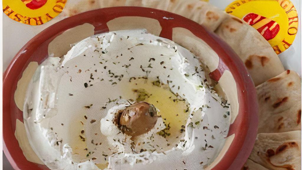 Labneh  Dip · Yogurt dip, made of middle eastern strained yogurt. Garnished with zaatar and extra virgin olive oil. (Dairy) Served with  one Pita