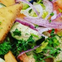 Fattoush Salad · Romaine lettuce, tomatoes, cucumbers, onions, sumac, fried pita bread and house dressing.