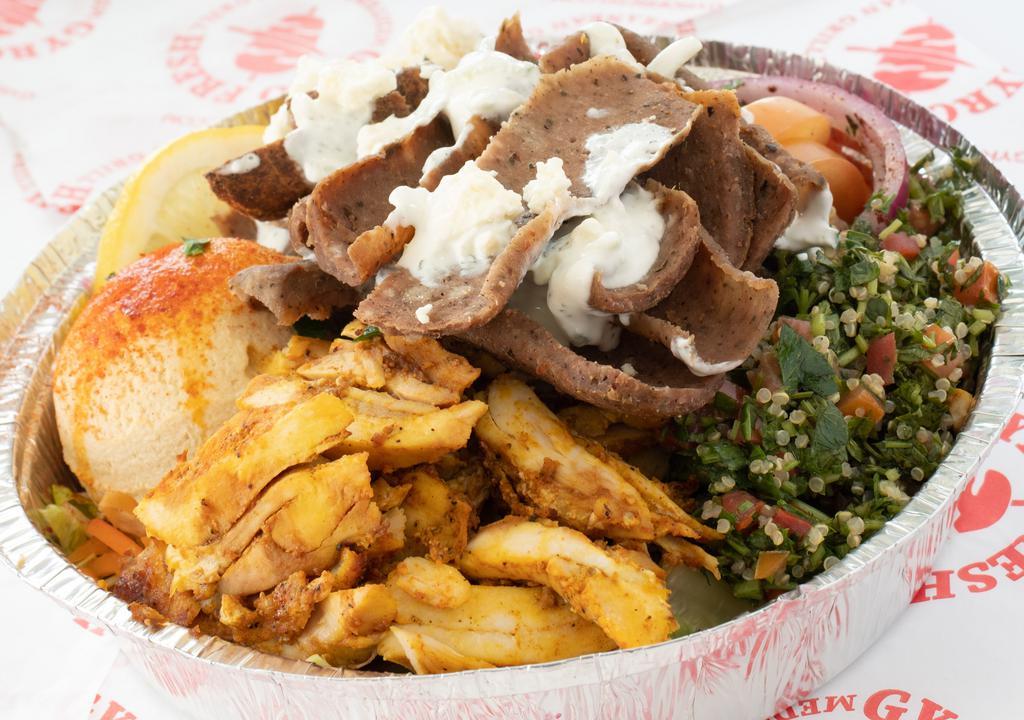 Chicken Shawarma Bowl · Authentic hand stacked , marinated in meddle eastern spices , boneless chicken carved of the vertical grill.