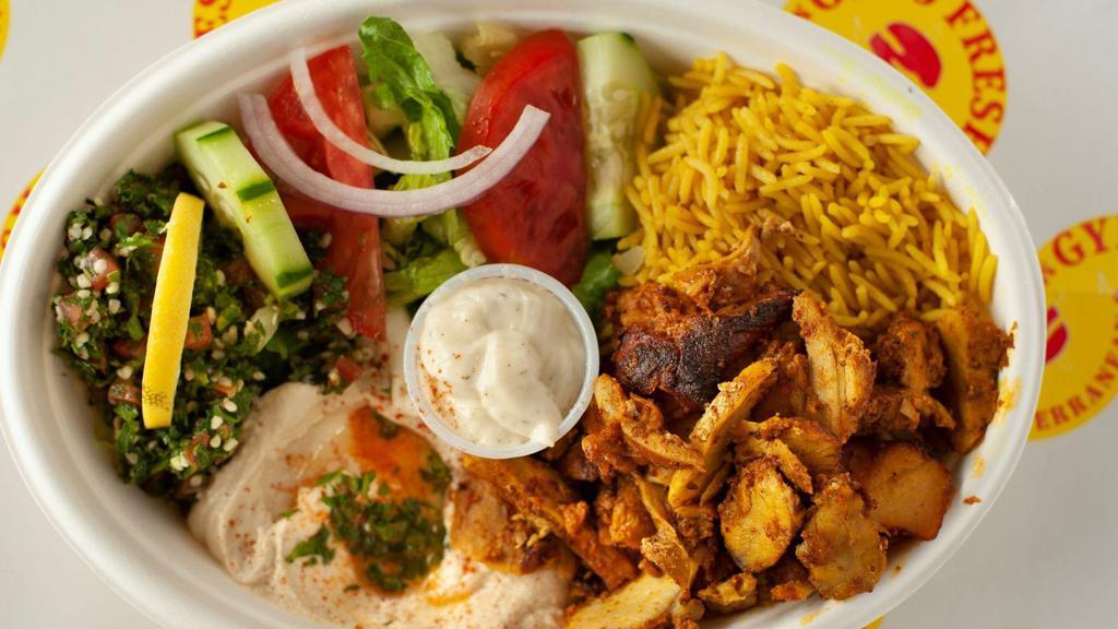 Chicken Kabab Bowl · Tender boneless chicken breast , marinated and broiled .