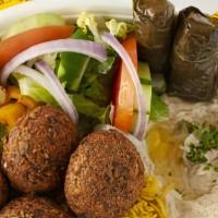 Falafel Bowl · Fresh ground garbanzo beans with herbs and spices . Fried to order.