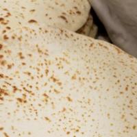 Side Pita Bread · Baked daily fresh , it is made for wrapping our fresh wraps.