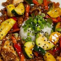 Crispy Chicken Bowl · Crispy fried sesame chicken and stir-fried veggies in teriyaki sauce with basmati rice, gree...
