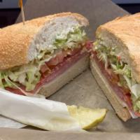 Italian Sub · Ham, Salami and Capicola.
(+shredded lettuce, tomatoes, provolone cheese, mayo & Italian dre...