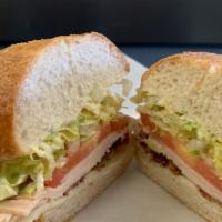 Deli Club Sub · Turkey & Bacon
(+shredded lettuce, tomatoes, provolone cheese, mayo & Italian dressing)