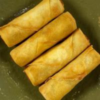 Vegetable Spring Rolls** · 4  crispy rolls filled with Cabbage, Green beans, Carrots, Mushrooms, Onions, Vermicelli, Sp...