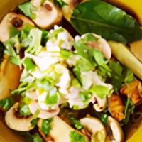 Tom Yum Gai** · Chicken broth with mushrooms, lemongrass, lime juice, kaffir lime leaves, scallions, and cil...