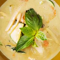 Green Curry** · Coconut milk, green curry paste, carrots, zucchini, bamboo shoots, bell pepper, and basil.