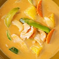 Massaman Curry** · Coconut milk, spicy curry paste, potatoes, carrots, onions, and bell pepper.