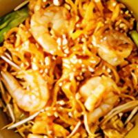 Pad Thai ** · Rice noodles, bean sprouts, green onions, egg, Pad Thai sauce with a side of crushed peanuts.