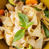 Drunken Noodles ** · Rice noodles, bamboo shoots, carrots, zucchini, bell pepper, mushroom, basil with a chili ga...