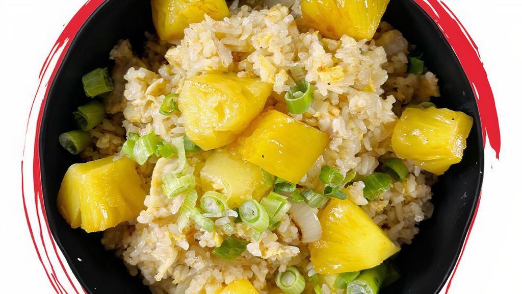 Pineapple Fried Rice ** · Rice, pineapple, egg, yellow onions and your choice of protein stir fried with our special cooking sauce topped with scallions.