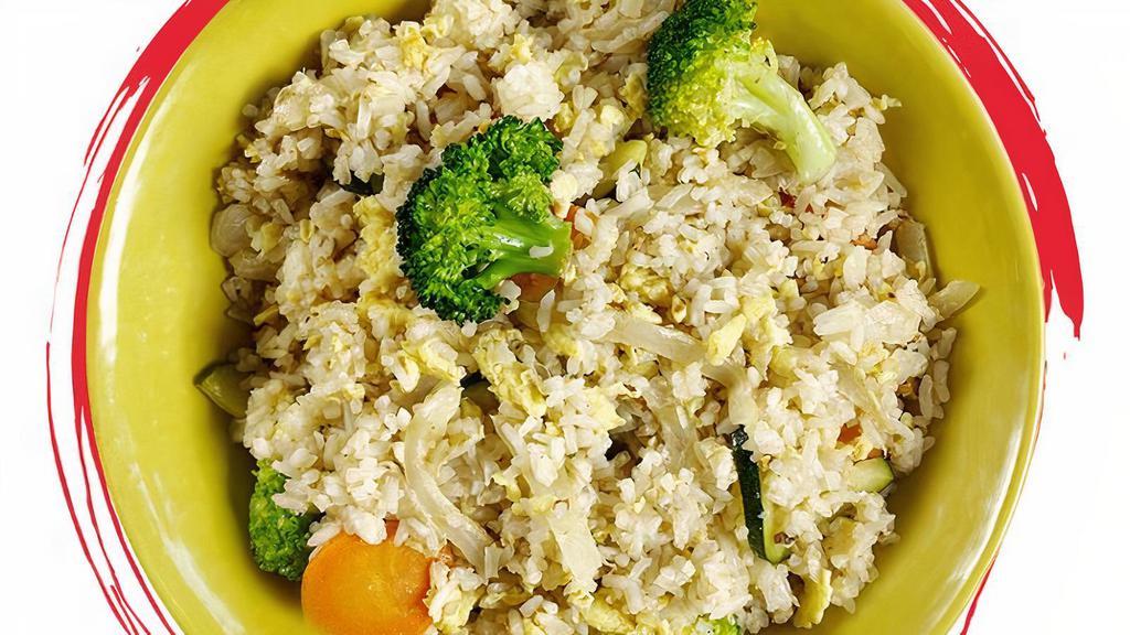 Vegetable Fried Rice ** · Rice, egg, carrots, broccoli, zucchini, yellow onions with special cooking sauce topped with scallions.