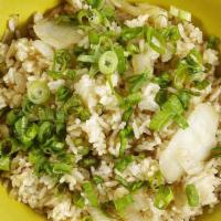 Vegan Fried Rice ** · Rice, yellow onions, Vegan cooking sauce, topped with scallions.