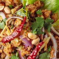 Nam Khao Tod (V), (Gf) · Crispy rice, red onion, green onion, cilantro, ginger, peanut, green leaf letter