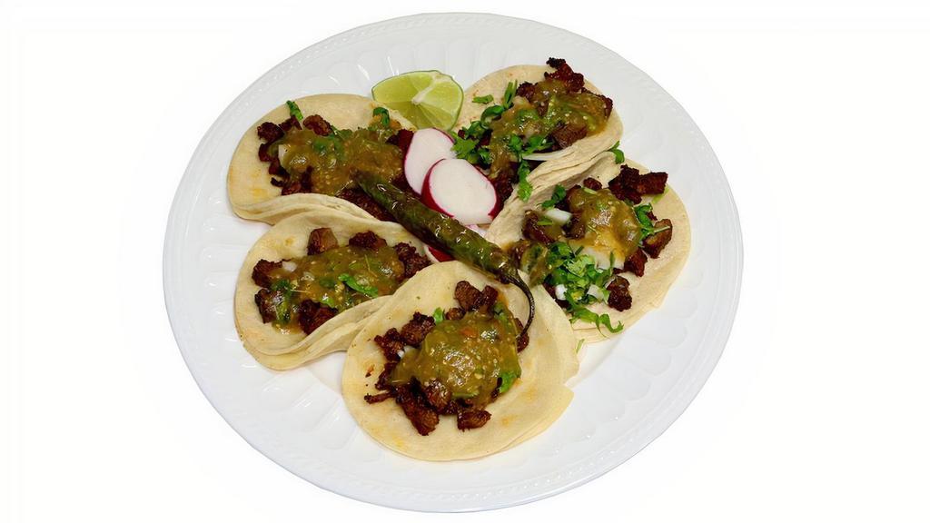 #5 - 5 Tacos · Always a fave! The famous street tacos! Corn tortilla tacos with your choice of protein. Topped with onions, cilantro, and house made tasty mild tomatillo salsa! Garnished with a lime, radishes, and a serrano pepper.