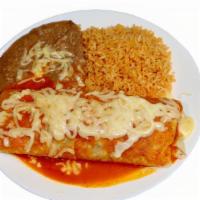 #6 - Burrito Plate · Flour tortilla filled with your choice of protein, beans and cheese inside. Smothered with o...