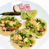 #11 - 3 Fish Tacos · Delicious savory fish tacos on a corn tortilla, Topped with pickled cabbage and onions, red ...