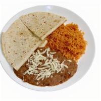 Kids Quesadilla · A flour tortilla filled with melted cheese. Served with rice an beans.