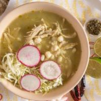 Pozole · Cabbage, white hominy, pico de gallo, chips, limones, choice of meat (chicken or pork), gree...