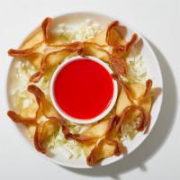 Wontons · Crispy fried wontons filled with cream cheese and served with house dipping sauce.