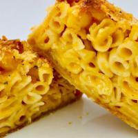 Tillamook Mac & Cheese Pie · Elbow pasta, melted four cheese sauce, herbed breadcrumb topping.
