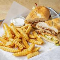 Turkey Melt · Turkey, bacon, lettuce, tomato and Swiss cheese served on a grilled pub roll.