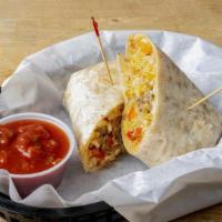 Breakfast Burrito · A flower tortilla filled with hashbrowns, sausage, red peppers and onions, egg and cheese se...
