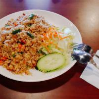 F-1 Chicken Fried Rice · Comes with egg carrots and peas.