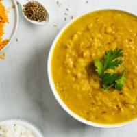 Daal Soup · Traditional lentils soup flavored with herbs and spices.