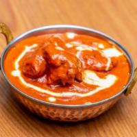 Butter Chicken · Popular. Chicken marinated with yogurt, creamy tomato sauces and spices. Served with basmati...