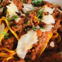 Bolognese · hand chopped beef, pork and veal, fennel soffrito, red sauce, spaghetti. served with sliced ...