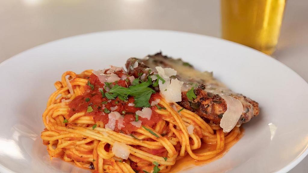 Chicken Parmesan · breaded topped with red sauce, mozzarella and grana padano, spaghetti
