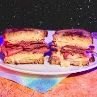 Pastrami Reuben · Dry aged pastrami, sauerkraut, russian dressing, swiss cheese, your choice of bread.