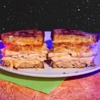 Turkey Reuben · Oven roasted turkey, cole slaw, thousand island dressing, swiss cheese, your choice of bread.