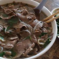 House Special Pho (Pho Dac Biet) · Gluten free. Fresh rice noodle soup with rare eye of round steak, well-done brisket, skirt f...