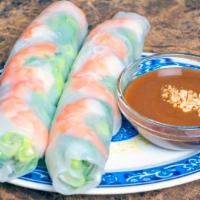 Spring Rolls (Goi Cuon) (2 Pcs) · Rice paper rolled up with vermicelli noodles, lettuce, and beansprouts with a choice of shri...