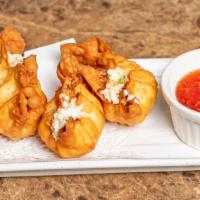 Crab Rangoon (6 Pcs) · Fried wontons filled with crab, cream cheese, and green onions. A sweet chili sauce for dipp...