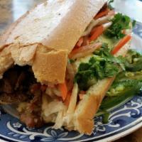 Banh Mi Tofu · Fried tofu sandwich. A fresh French baguette filled with cilantro, jalapeno peppers, pickled...