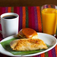 Tamal Pork · Traditional Guatemalan corn dough mix wrapped and steam cooked in banana leaves.  Choice of ...