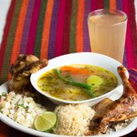 Caldo De Gallina · Traditional hen soup with vegetables.  Served with rice and grilled hen on the side. Sopa tr...