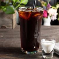 Iced Coffee · Tanzanian peaberry brewed coffee with light lemon and cocoa notes.