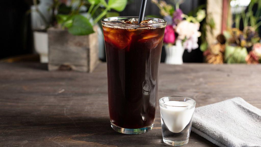 Iced Coffee · Tanzanian peaberry brewed coffee with light lemon and cocoa notes.