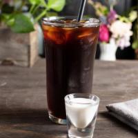 Americano · Shots of espresso and water for those who enjoy the espresso forward flavor of sweet caramel...