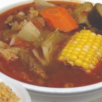 Caldo De Res · Mexican style beef stew with cabbage, potatoes, carrots, zucchini and corn on the cob. Serve...