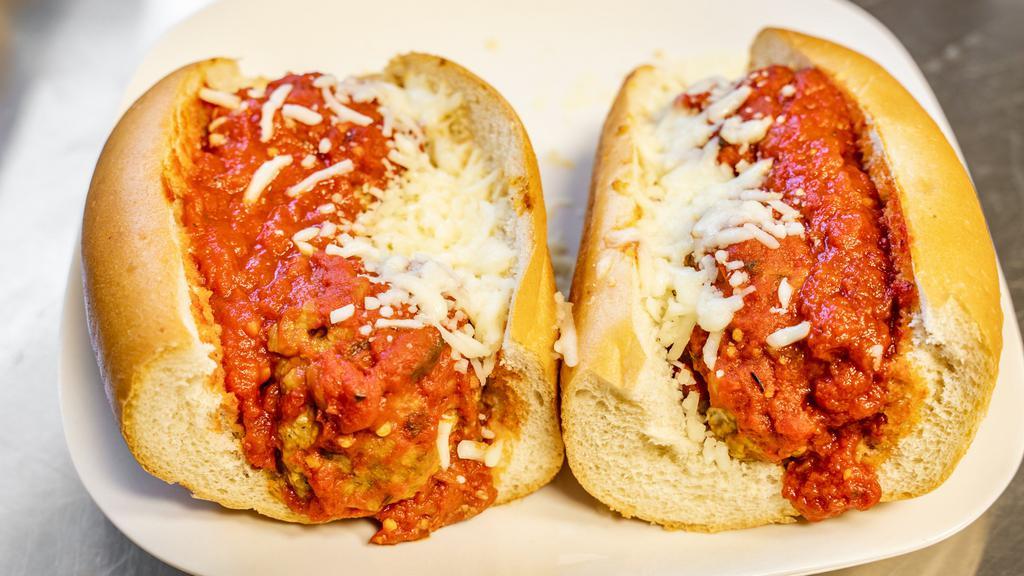 Meatball · Fresh Baked Sub Roll Filled with Large Tender Meatballs Smothered in 