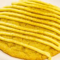 Golden Lemon · OMG's  Soft Batch Lemon Cookie. Lemon Drizzle Topped with Gold Sugar Sprinkles.