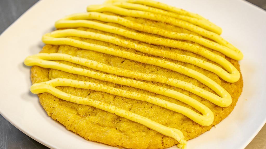 Golden Lemon · OMG's  Soft Batch Lemon Cookie. Lemon Drizzle Topped with Gold Sugar Sprinkles.